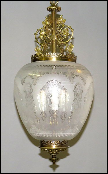 FROSTED GLASS AND PATINATED METAL HANGING LIGHT FIXTURE: FROSTED GLASS AND PATINATED METAL HANGING LIGHT FIXTURE. H: 23'' W: 12''
