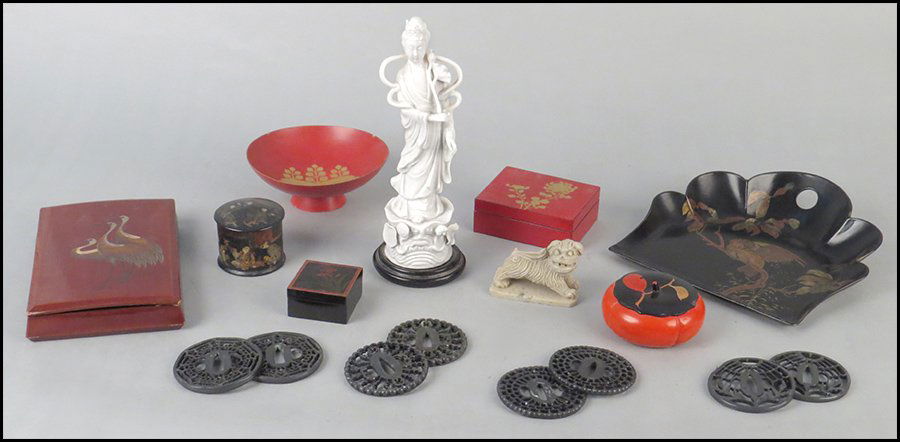 COLLECTION OF ASIAN TABLE ARTICLES.: COLLECTION OF ASIAN TABLE ARTICLES. Comprised of a porcelain goddess figure, an assortment of lacquered items, eight metal coasters, and a stone foo dog Figure H: 10''
