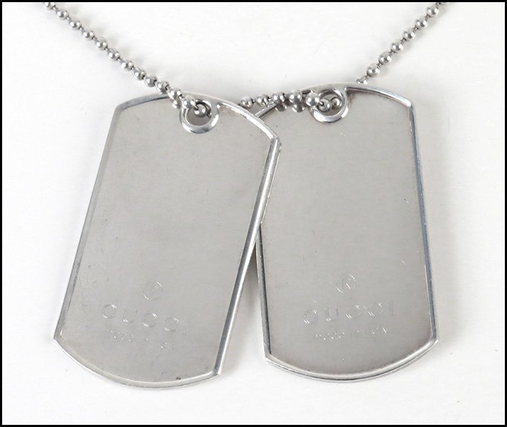 GUCCI STERLING SILVER DOG TAGS.: GUCCI STERLING SILVER DOG TAGS. With sterling silver ball chain Chain length: 24" Wt: 49 g