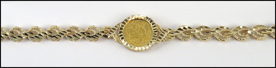 1989 CHINESE .999 GOLD COIN.: 1989 CHINESE .999 GOLD COIN. Fitted in a 14 karat yellow gold bracelet Length: 6.1" Wt: 11.6 grams
