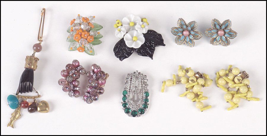 ART DECO TRIFARI, KUSHMAN, AND FISHEL GREEN AND WHITE R: ART DECO TRIFARI, KUSHMAN, AND FISHEL GREEN AND WHITE RHINESTONE CLIP. Together with a pair of Hobe pink bead earclips, a pair of yellow bead earclips, a pair of blue enamel flower screwback earrings,