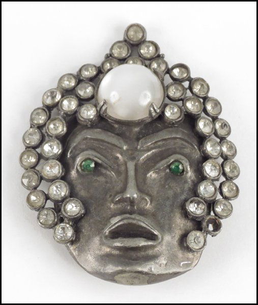 RHINESTONE AND FAUX MOONSTONE 'CAMBODIAN PRINCE' BROOCH: RHINESTONE AND FAUX MOONSTONE 'CAMBODIAN PRINCE' BROOCH. Unsigned 3.25" x 2.5"