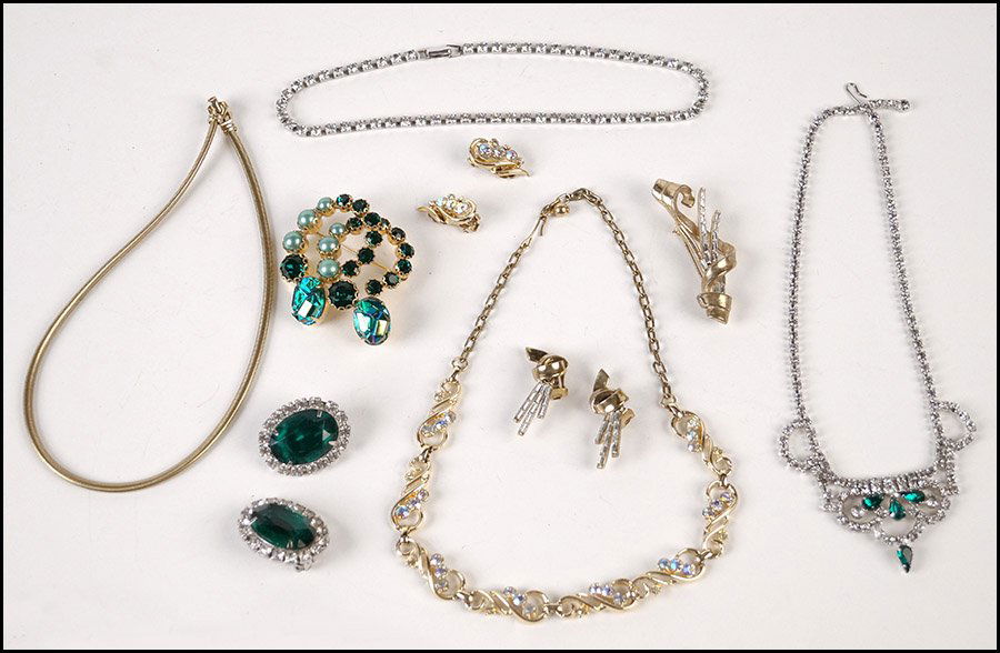 SCHIAPARELLI GREEN RHINESTONE AND FAUX PEARL BROOCH.: SCHIAPARELLI GREEN RHINESTONE AND FAUX PEARL BROOCH. Together with a pair of green and white rhinestone earclips, a green and white rhinestone necklace, a Coro white rhinestone necklace, a Coro gold t