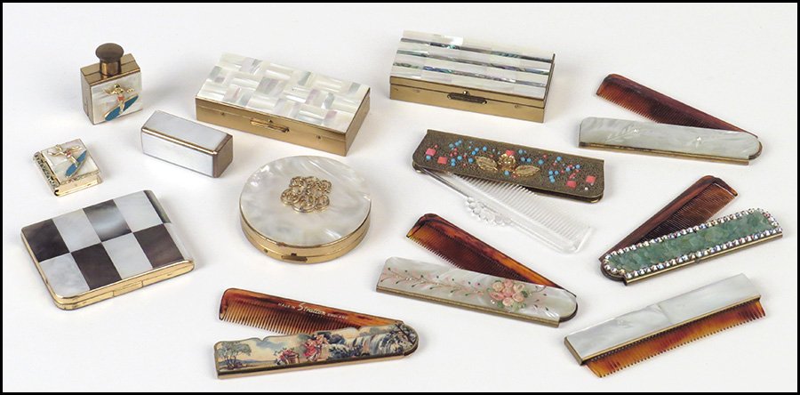 TWO MOTHER OF PEARL BOXES.: TWO MOTHER OF PEARL BOXES. Together with two compacts, six combs, a perfume bottle, a pill box, and a lipstick container .7'' x 3.6'' x 2