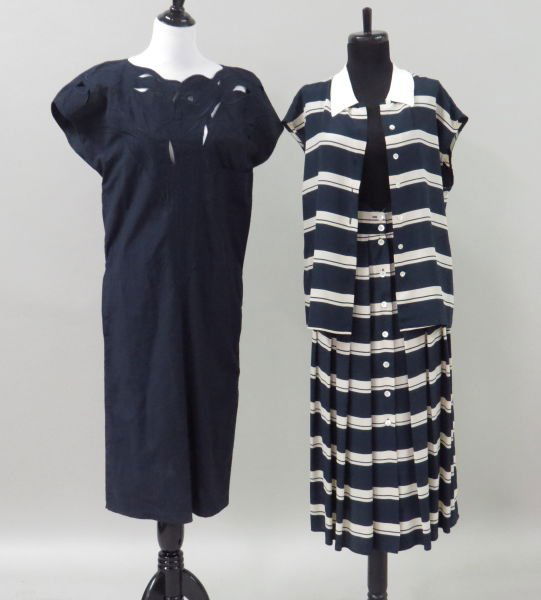 BYBLOS SKIRT ENSEMBLE.: BYBLOS SKIRT ENSEMBLE. Comprised of a button front sleeveless blouse and a button front skirt. Made in Italy. Acetate, silk, and rayon blend. Together with a Krizia navy cover up dress. Made in Italy.