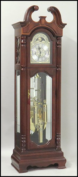 HOWARD MILLER INLAID MAHOGANY GRANDFATHER CLOCK.: HOWARD MILLER INLAID MAHOGANY GRANDFATHER CLOCK. With pendulum and weights 89'' x 23.5'' x 14''