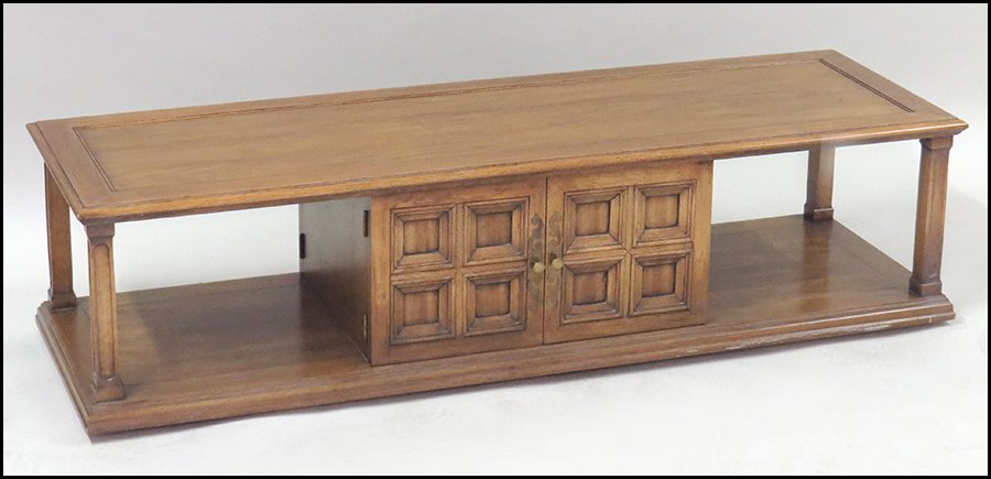 WOOD ENTERTAINMENT CABINET.: WOOD ENTERTAINMENT CABINET. With bilateral center cupboard. On wheels 16'' x 62'' x 20''