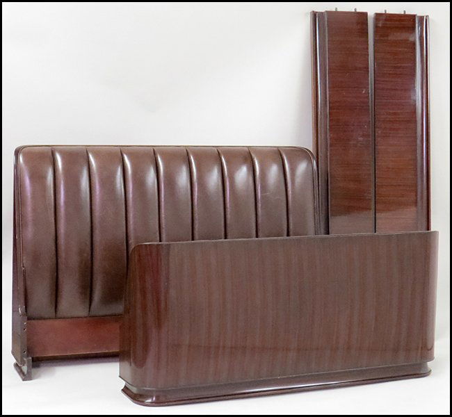 RALPH LAUREN MAHOGANY AND BROWN LEATHER METROPOLIS BED.: RALPH LAUREN MAHOGANY AND BROWN LEATHER METROPOLIS BED. Comprised of a headboard (44'' x 65'' x 9''), a footboard (30'' x 65'' x 7''), and two side rails (13'' x 74'' x 1.25'' each)