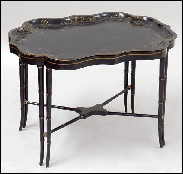 ENGLISH PAINTED TOLE TRAY TABLE.: ENGLISH PAINTED TOLE TRAY TABLE. Raised on an faux bamboo ebonized wood base H: 22.5" x W: 32" x D: 24"
