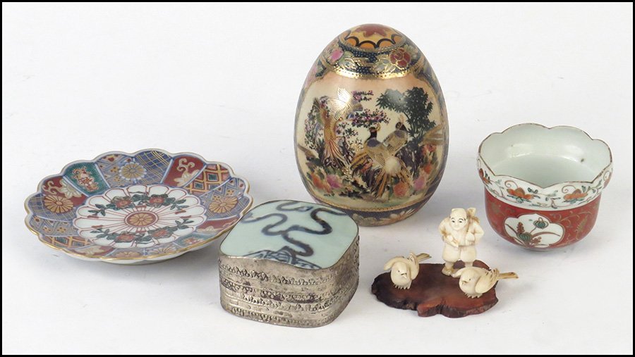COLLECTION OF DECORATIVE ITEMS.: COLLECTION OF DECORATIVE ITEMS. Comprised of a pair of carved ivory birds, an ivory figure, a porcelain teacup and saucer, a shard box, and a Satsuma egg Egg height: 4.5"