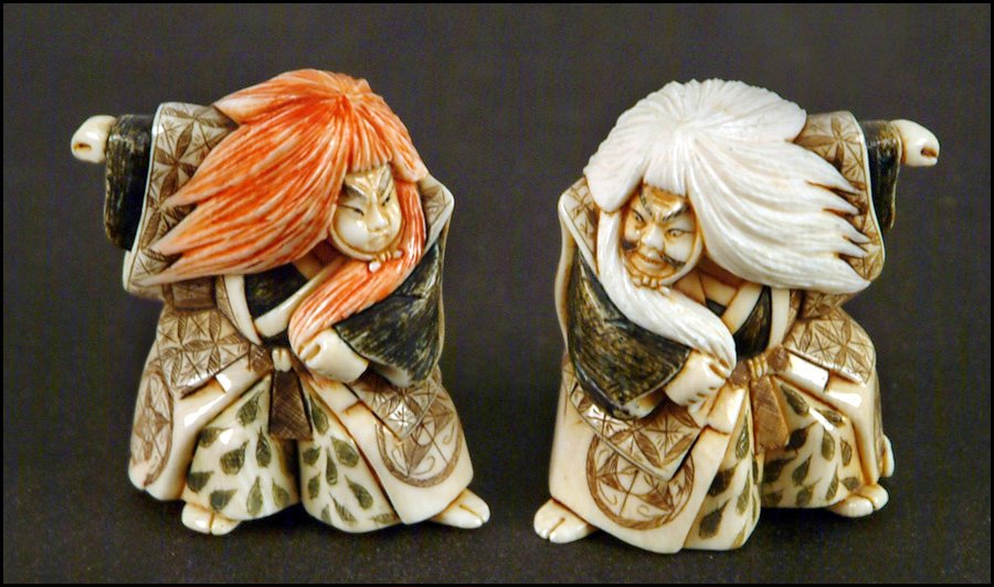 TWO JAPANESE CARVED IVORY NETSUKES.: TWO JAPANESE CARVED IVORY NETSUKES. Both signed on the bottom Height: 2"