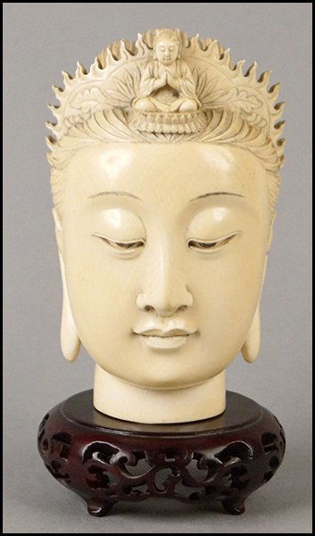 CARVED IVORY BUDDHA HEAD.