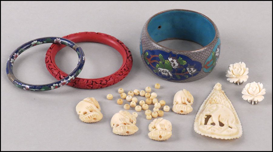 PAIR OF CARVED IVORY EARCLIPS.: PAIR OF CARVED IVORY EARCLIPS. Together with a cinnabar bracelet, two cloisonne bracelets, and a carved bone elephant motif necklace