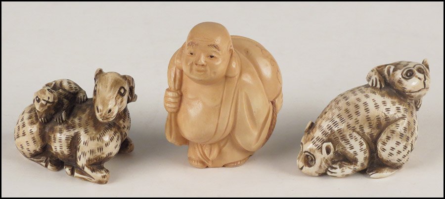 TWO CARVED IVORY ANIMAL NETSUKE.: TWO CARVED IVORY ANIMAL NETSUKE. Together with a carved ivory figural netsuke