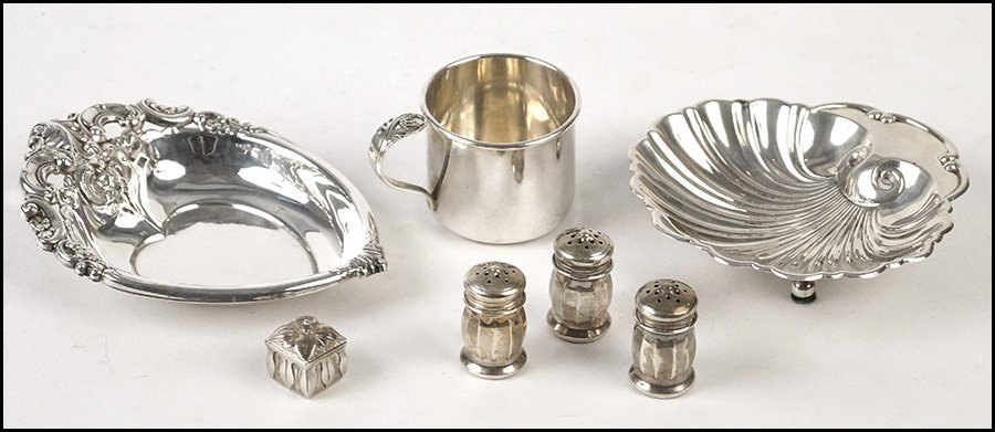 THREE INDIVIDUAL STERLING SILVER SALT SHAKERS.: THREE INDIVIDUAL STERLING SILVER SALT SHAKERS. Together with two sterling silver dishes, an International sterling silver baby cup in the Spring Glory pattern, and a sterling silver pill box 8.00 ozt