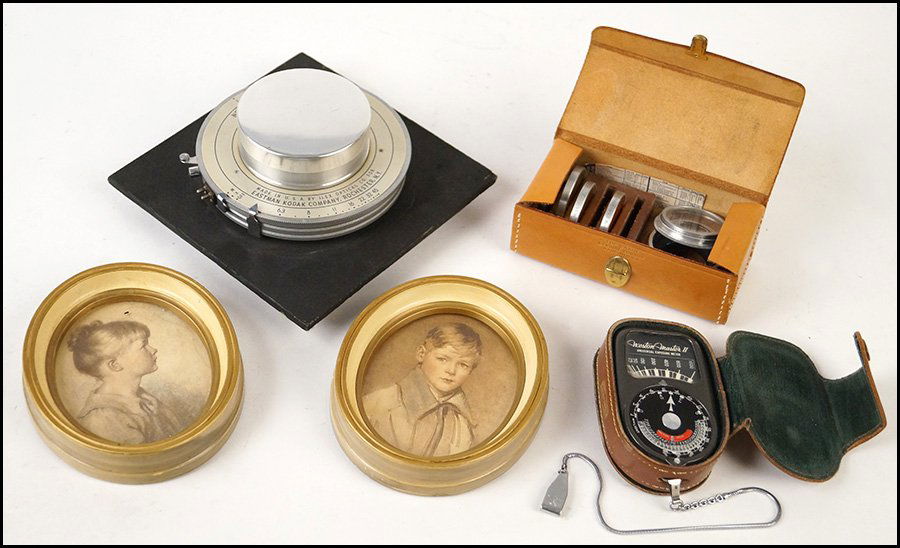 EASTMAN KODAK NO. 5 UNIVERSAL SYNCHRO SHUTTER LENS.: EASTMAN KODAK NO. 5 UNIVERSAL SYNCHRO SHUTTER LENS. Together with a Weston light meter, a set of Tiffen filters, and two prints after Arthur Garratt of Peter and Charlotte