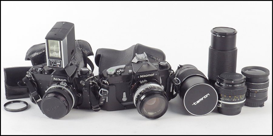 NIKON SLR.: NIKON SLR. With a leather case. Together with a Nikomat SLR camera, six Lenses (two Nikkor 50mm, a Tamron 200mm, nikkor 55mm, vitacom 70-210mm, and hanimar 35mm)