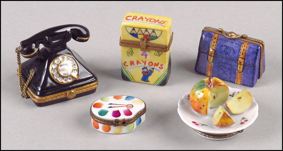 COLLECTION OF LIMOGES PORCELAIN BOXES.: COLLECTION OF LIMOGES PORCELAIN BOXES. Comprised of a telephone, a box of crayons, a suitcase, an artist's palette, and a sliced apple
