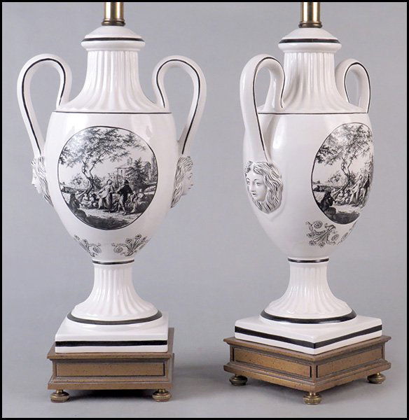 PAIR OF FREDERICK COOPER TRANSFER DECORATED URN FORM TA: PAIR OF FREDERICK COOPER TRANSFER DECORATED URN FORM TABLE LAMPS. Bearing Continental scenes and figural decoration at the handles Urn height: 16"