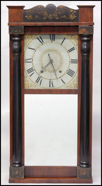 EARLY 19TH CENTURY ELI TERRY MAHOGANY WALL CLOCK.: EARLY 19TH CENTURY ELI TERRY MAHOGANY WALL CLOCK. With lower mirror and painted detailing. Manufactured by Eli Terry for George Mitchell of Bristol, Connecticut. Original paper label on case interior