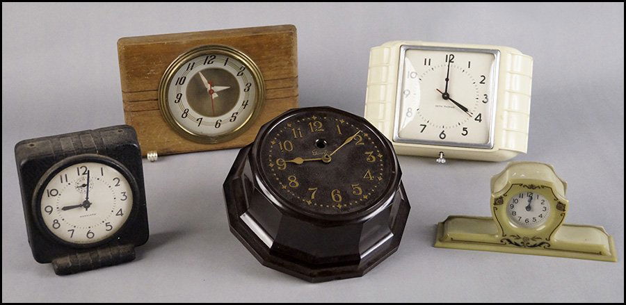 LACKNER NEON GLO DESK CLOCK.: LACKNER NEON GLO DESK CLOCK. Together with a collection of wall and desk clocks. Includes makers Waralarm, Telechron, Lackner, and Seth Thomas H: 6.5" x W: 9" x D: 3.5""