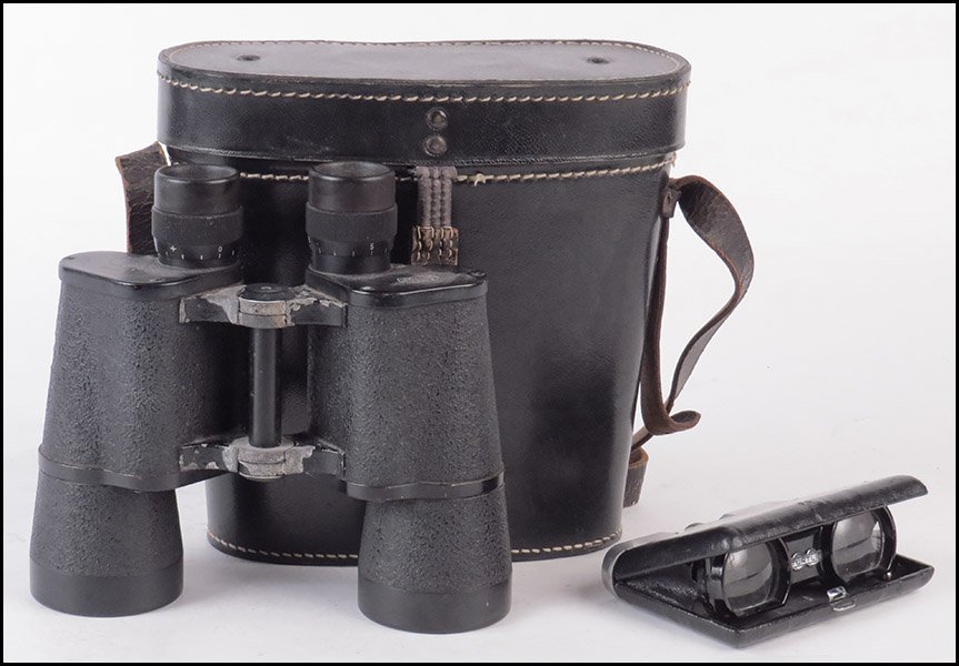 ELEITZ WETZLAR 7X50 BINOCULARS.: ELEITZ WETZLAR 7X50 BINOCULARS. In leather case with strap. Marked "Eleitz Wetzlar 7x50 #478075." Together with a pair of Turtle folding binoculars, made in Japan, in black leather case (3.25'' x 4.8'