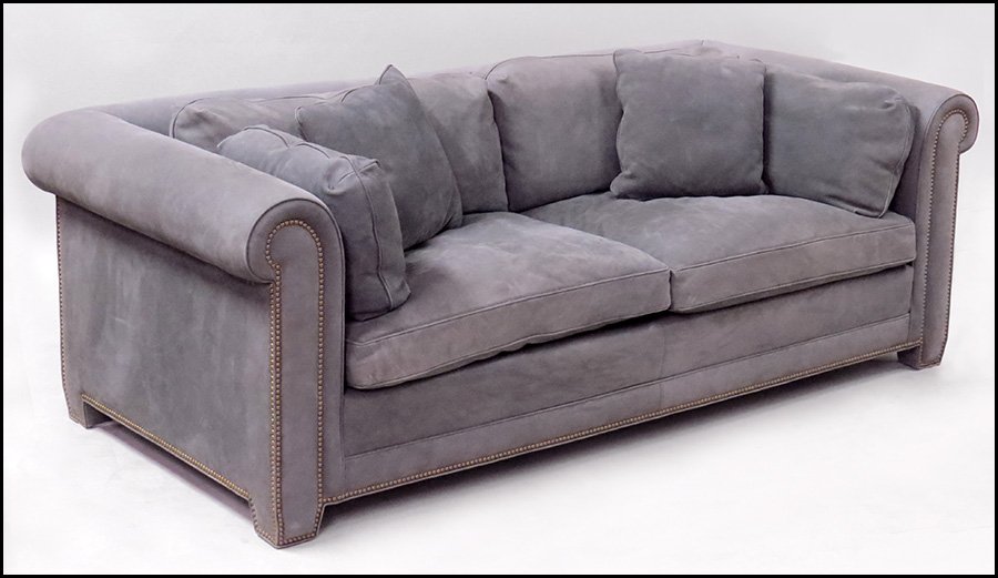 LEATHER UPHOLSTERED SOFA.: LEATHER UPHOLSTERED SOFA. Bearing nailhead trim. Labeled "Marco, San Fransisco" H: 31" W: 90" D: 42"