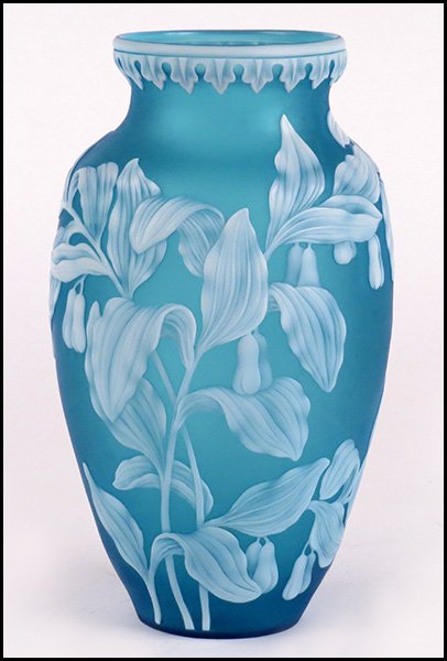 CAMEO VASE ATTRIBUTED TO THOMAS WEBB & SONS.: CAMEO VASE ATTRIBUTED TO THOMAS WEBB & SONS. Blue and white cameo vase bearing foliate and butterfly motif Vase height: 8"