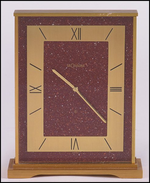LE COULTRE BRASS DESK CLOCK.: LE COULTRE BRASS DESK CLOCK. H: 5.5" x W: 4.5" x D: 1.5"