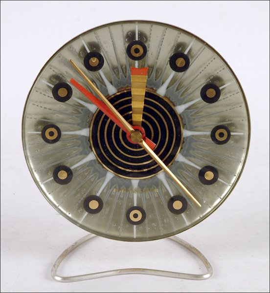 HIGGINS TABLE CLOCK.: HIGGINS TABLE CLOCK. For general electric. Glass and aluminum Clock face diameter: 8"