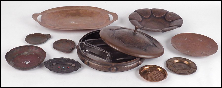COLLECTION OF HAMMERED COPPER ARTS AND CRAFTS STYLE: COLLECTION OF HAMMERED COPPER ARTS AND CRAFTS STYLE TABLE ARTICLES. Comprised of two dishes, two bowls, and a covered tray. Together with five souvenir dishes Largest diameter: 10"