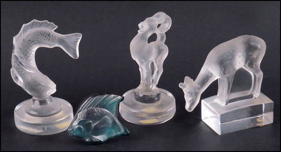 COLLECTION OF FOUR LALIQUE ANIMAL FIGURES.: COLLECTION OF FOUR LALIQUE ANIMAL FIGURES. Comprised of a deer, fish, ram, and small blue glass fish. All figures have Lalique etched signature or stamp Tallest fish height: 4"