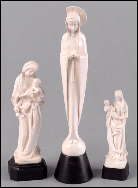 THREE ITALIAN CARVED IVORY MADONNAS.: THREE ITALIAN CARVED IVORY MADONNAS. All raised on ebonized wood bases Tallest ivory: 5"