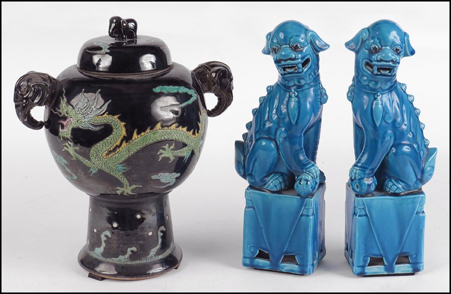 CHINESE GLAZED AND PAINTED PORCELAIN URN.: CHINESE GLAZED AND PAINTED PORCELAIN URN. Bearing elephant handles, dragon decoration, and six character mark. With lid. Together with a pair of Chinese porcelain foo dogs (H: 13'') Urn H: 10.75''