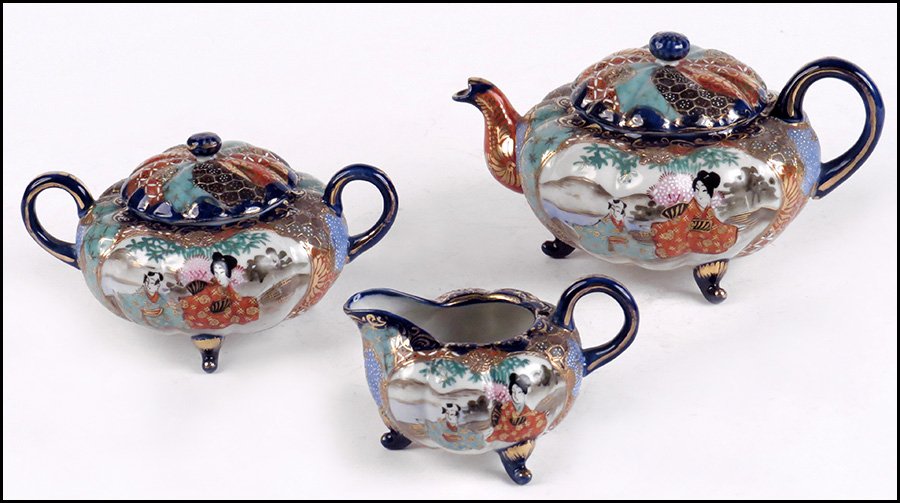 CHINESE HAND-PAINTED TEA SET.: CHINESE HAND-PAINTED TEA SET. Comprised of a covered teapot, covered sugar, and a creamer. Stamped on bottoms 'Hand Painted GRP Shofu Nippon' Teapot height: 5"