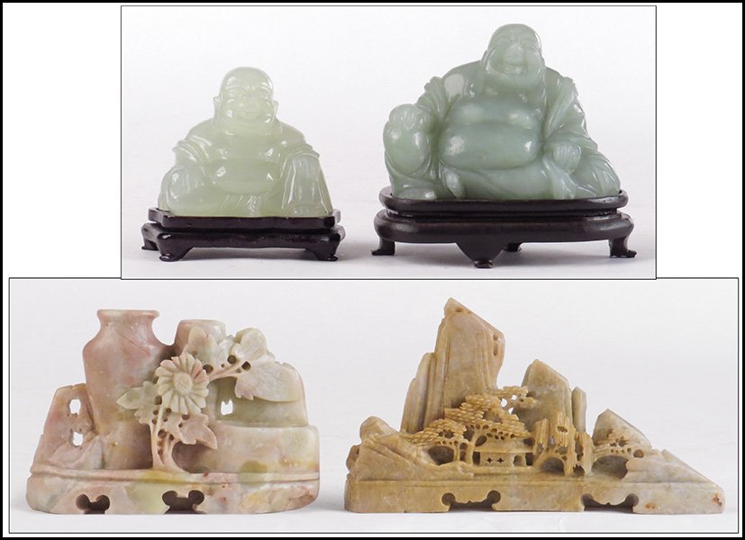 TWO CHINESE SOAPSTONE CARVINGS.: TWO CHINESE SOAPSTONE CARVINGS. Together with two carved green stone seated buddhas. One soapstone depicts a village landscape and the other, vessels with foliage Largest soapstone height: 3.5" width: