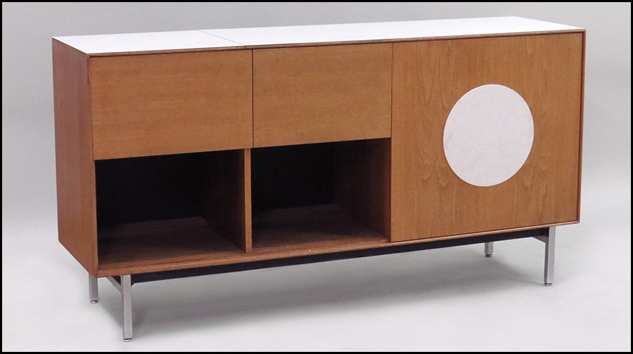GEORGE NELSON FOR HERMAN MILLER WALNUT VENEER STEREO CA: GEORGE NELSON FOR HERMAN MILLER WALNUT VENEER STEREO CABINET. With laminate top 35'' x 66'' x 18.5''