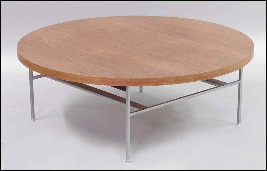 GEORGE NELSON FOR HERMAN MILLER WALNUT VENEER COCKTAIL : GEORGE NELSON FOR HERMAN MILLER WALNUT VENEER COCKTAIL TABLE. Round, with stainless steel base H: 14.5'' Diameter: 40''