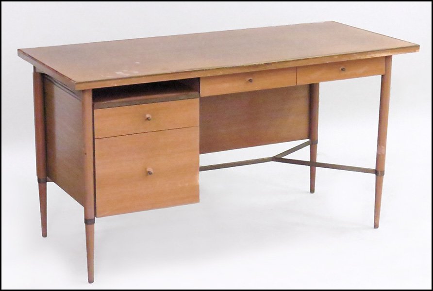 PAUL MCCOBB CONNOISSEUR COLLECTION WALNUT DESK.: PAUL MCCOBB CONNOISSEUR COLLECTION WALNUT DESK. With brass accents 30'' x 56'' x 25''