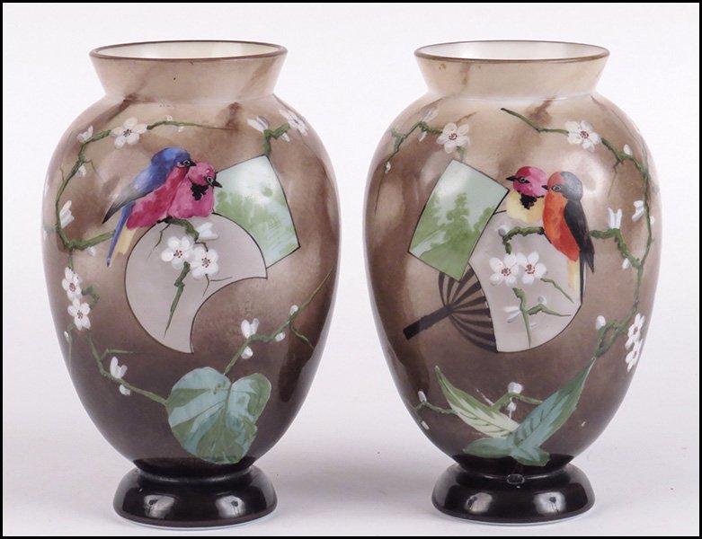 TWO BACCARAT HANDPAINTED OPALINE VASES.: TWO BACCARAT HANDPAINTED OPALINE VASES. Bearing birds and floral decoration. Both signed "Baccarat" Vase H: 8.25''