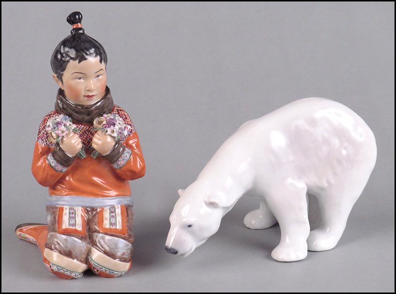 TWO ROYAL COPENHAGEN PORCELAIN FIGURES.: TWO ROYAL COPENHAGEN PORCELAIN FIGURES. Comprised of a "Gronland" girl holding flowers, by Carl Martin-Hansen, numbered 12415 and a polar bear, numbered 321. Both stamped "Denmark" Taller H: 6''