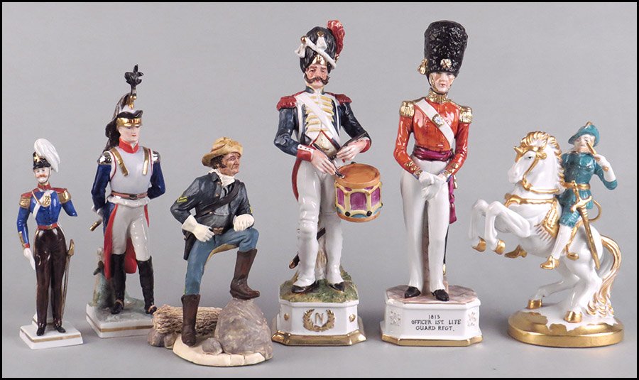 COLLECTION OF PORCELAIN SOLDIER FIGURES.: COLLECTION OF PORCELAIN SOLDIER FIGURES. Including a Capodimonte El Pietro soldier bearing a drum (edition 55/1259), a Royal Crown porcelain soldier No. 2431 titled "1815 Officer 1st Life Guard Regt,"