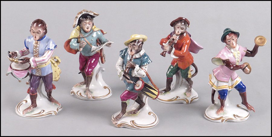 FIVE GERMAN PAINTED AND PARCEL GILT PORCELAIN MONKEY BA: FIVE GERMAN PAINTED AND PARCEL GILT PORCELAIN MONKEY BAND FIGURES.