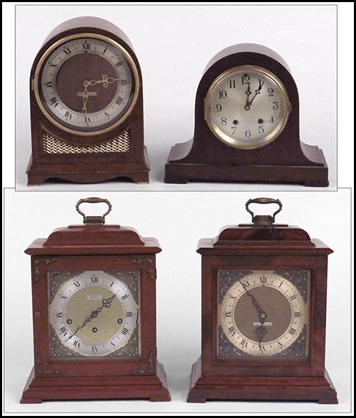 FOUR SETH THOMAS MANTLE CLOCKS.: FOUR SETH THOMAS MANTLE CLOCKS. Includes a 'Legacy' mantle clock with original paperwork and key, an electric clock chassis fitted with a battery operated movement, one 'Northbury' electric clock, and