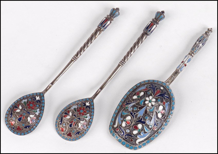 RUSSIAN GILT SILVER AND CHAMPLEVE ENAMEL SUGAR SCOOP.: RUSSIAN GILT SILVER AND CHAMPLEVE ENAMEL SUGAR SCOOP. Together with a pair of Russian gilt silver and champleve enamel spoons Spoon length: 4.25"