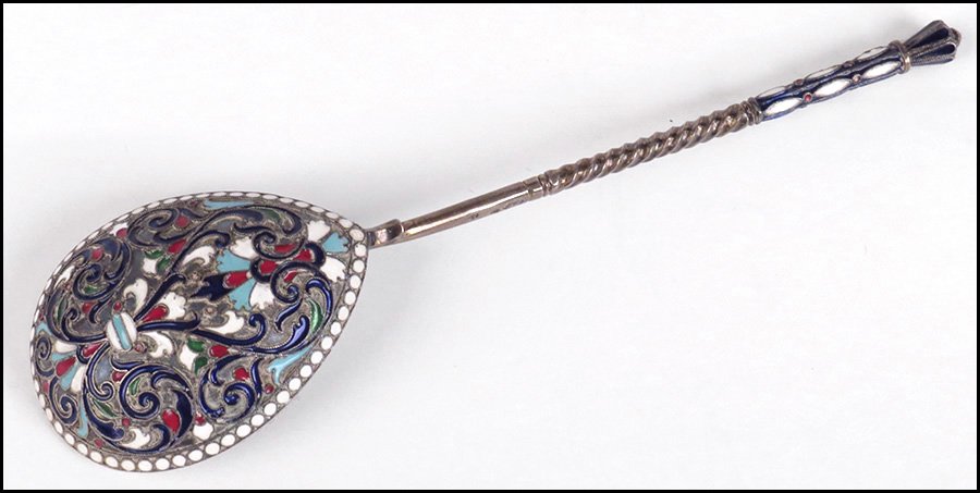 RUSSIAN GILT SILVER SERVING SPOON.: RUSSIAN GILT SILVER SERVING SPOON. Bearing champleve enamel decoration Length: 7.5"