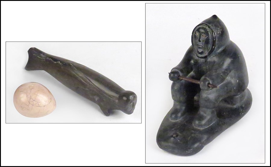 GROUP OF CARVED STONE INUIT ITEMS.: GROUP OF CARVED STONE INUIT ITEMS. Comprised of a seal, an eskimo fishing, and an egg bearing two turtle figures Seal L: 8.5''