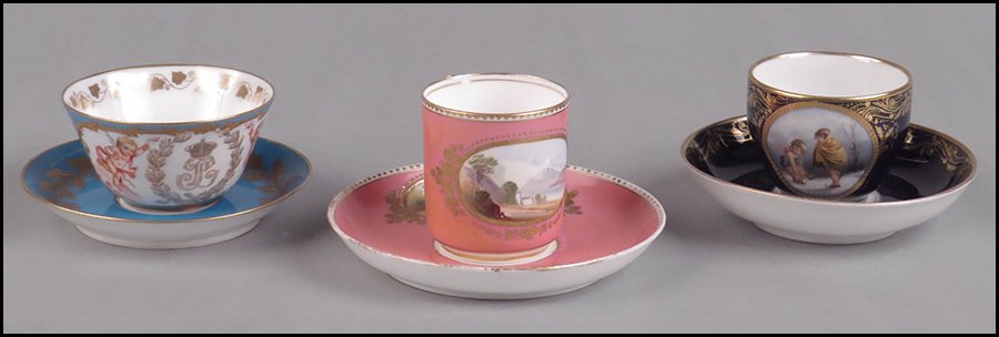 THREE CONTINENTAL 19TH CENTURY PORCELAIN TEACUPS AND SA: THREE CONTINENTAL 19TH CENTURY PORCELAIN TEACUPS AND SAUCERS. One KPM, one Sevres