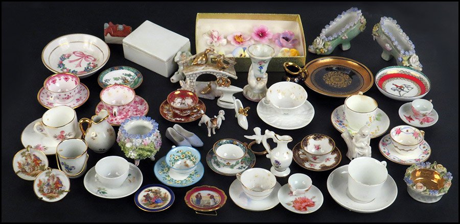 COLLECTION OF ASSORTED MINIATURE PORCELAIN CUPS AND SAU: COLLECTION OF ASSORTED MINIATURE PORCELAIN CUPS AND SAUCERS. Comprised of fifteeen matching sets including Spode and Crown Staffordshire, eight assorted Limoges pieces, and a variety of other miniatur