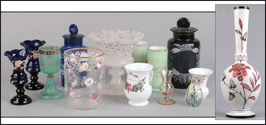 COLLECTION OF ASSORTED ENAMELED GLASS TABLE ARTICLES.: COLLECTION OF ASSORTED ENAMELED GLASS TABLE ARTICLES. Comprised of a cased glass tall vase, two small cased glass vases (one has the name 'Cathrine'), three green cased glass cups, an opaline glass co